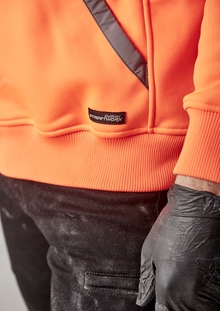 A bright orange unisex water-resistant hoodie with a hood and a pocket on the sleeve, featuring a logo.