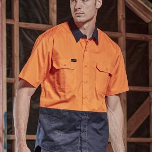A short sleeve work shirt in bright orange and navy blue, featuring two chest pockets and a logo.