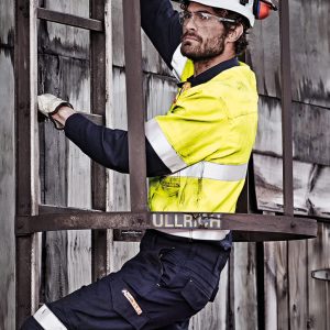 A man wearing a hi-vis yellow and navy work shirt, climbing a metal ladder, with protective gear and glasses.