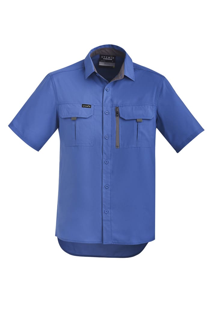 A blue short sleeve button-up shirt featuring two front pockets and a chest zip pocket. It has a logo.