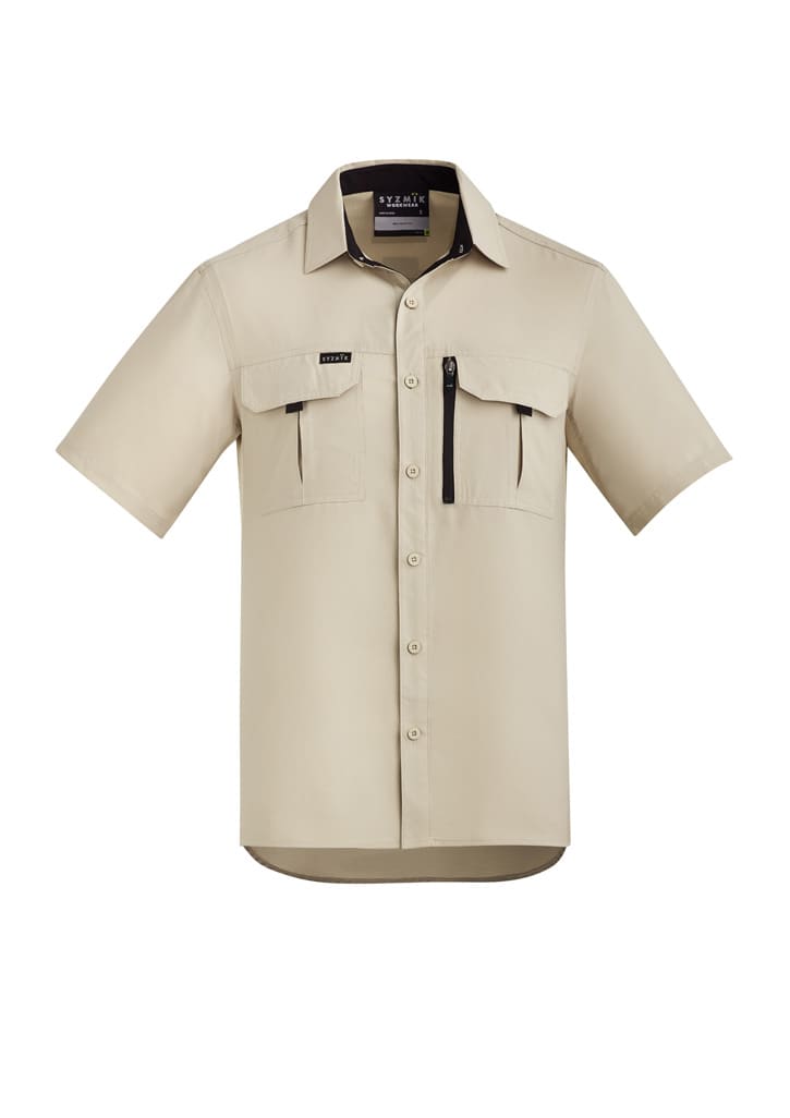 A beige short sleeve button-up shirt with two chest pockets and a zip pocket on the front. It features a logo.