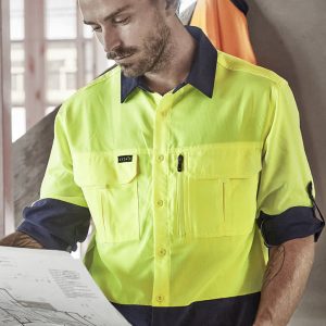 A men's hi-vis long sleeve shirt in bright yellow and navy, featuring a logo and pockets.