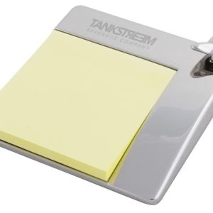 Aero Note Holder with a silver finish and a yellow sticky note pad. Features a branding logo.