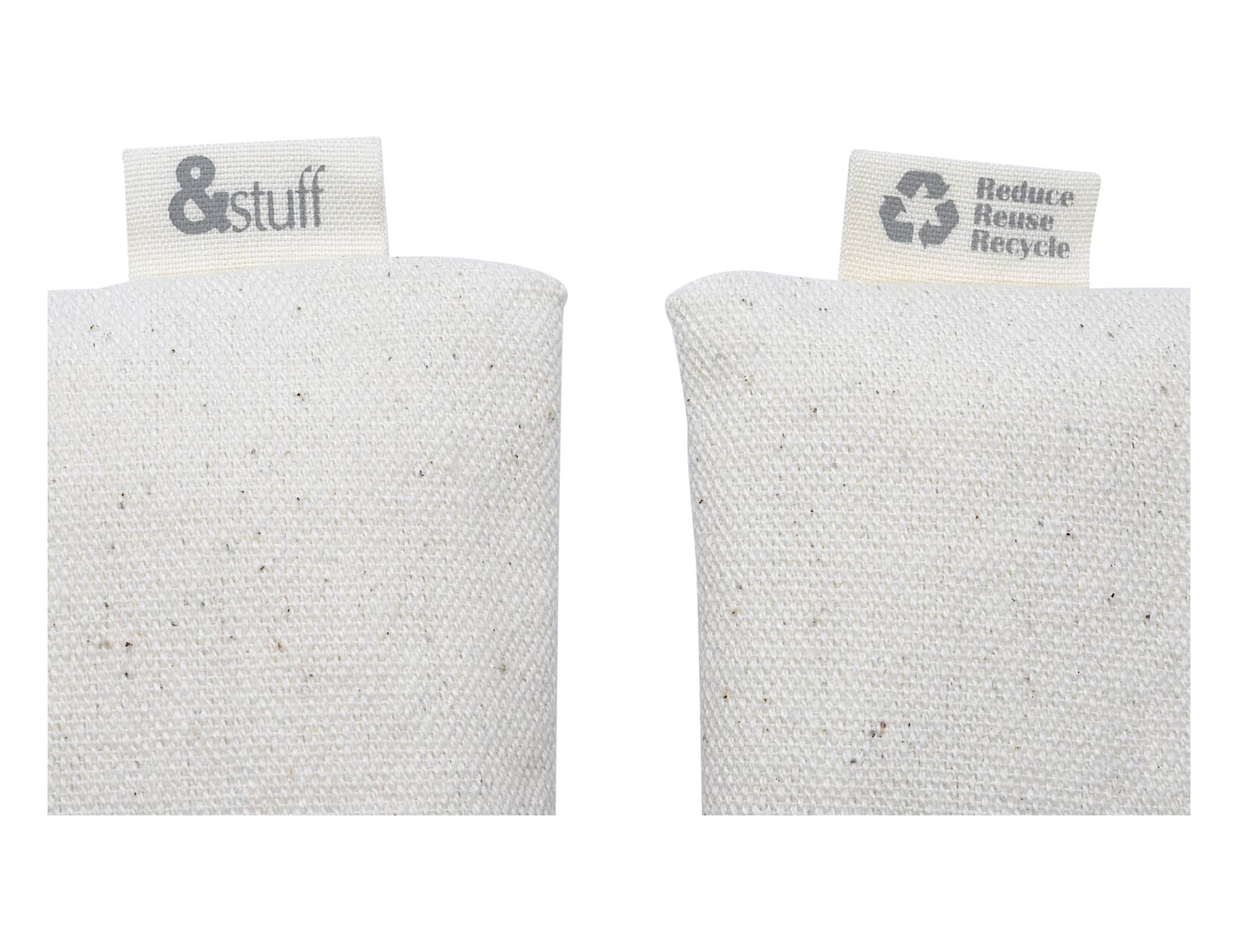 A cream-coloured pencil case featuring textured fabric, with labels indicating brand and recycling message.