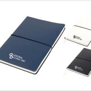 A Tango A5 notebook in navy, white, and black, featuring a logo on the cover.