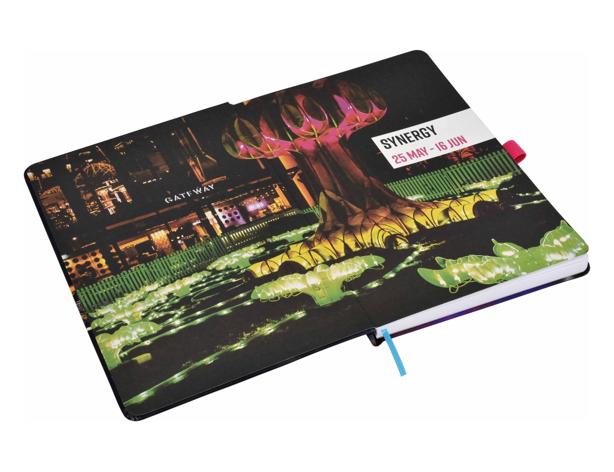 A full colour A5 notebook with a vibrant design and a ribbon bookmark. It features a logo on the cover.