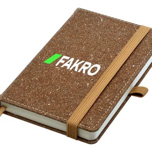 A brown bonded leather A6 notebook with an elastic band closure and a branded logo on the cover.