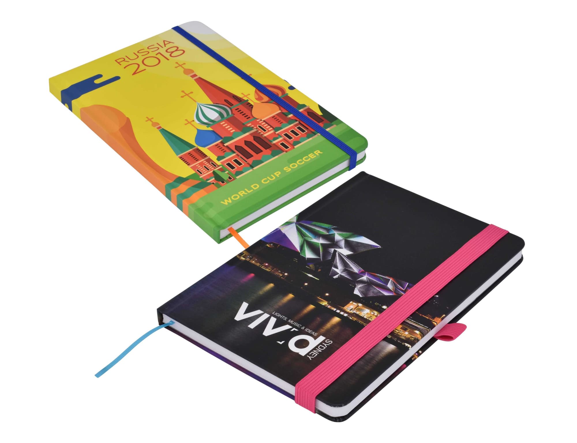 Two A5 notebooks with colourful covers; one features a design for the Russia 2018 World Cup, the other has a black cover with a pink band.