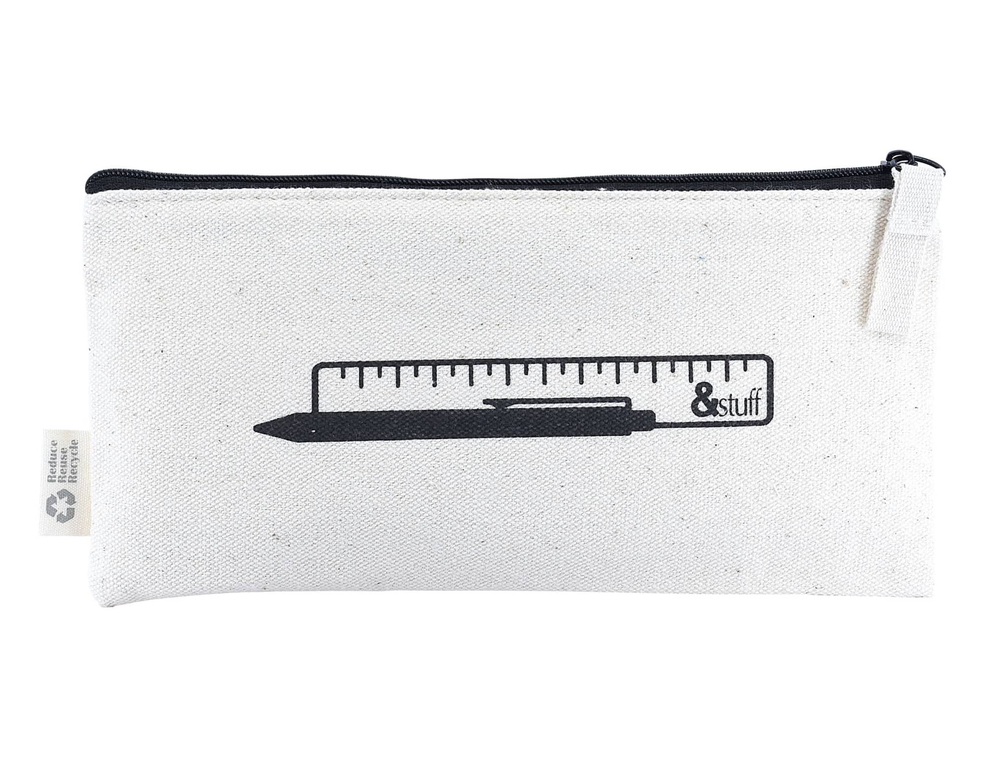 A white pencil case featuring a graphic of a ruler and pen, with a black zip and logo on the side.