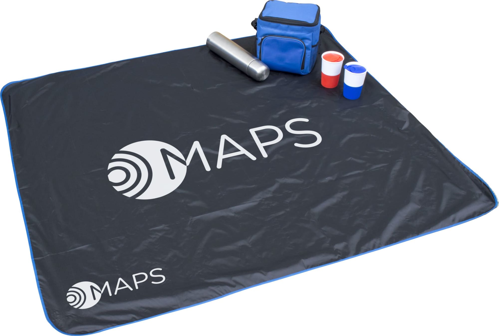 A black picnic mat with blue trim, a drink bottle, a blue cooler bag, and stacked cups in red and white.
