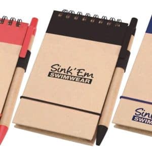 A notepad set featuring three colours: red, black, and blue, each with a matching pen and a logo.