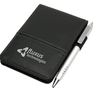 A black notepad with a silver pen secured on the side. The notepad features a logo.