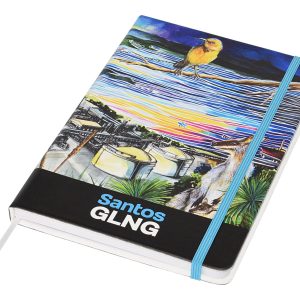 A full-colour A5 notebook featuring a vibrant design with a bird and landscape, complete with a blue elastic band.