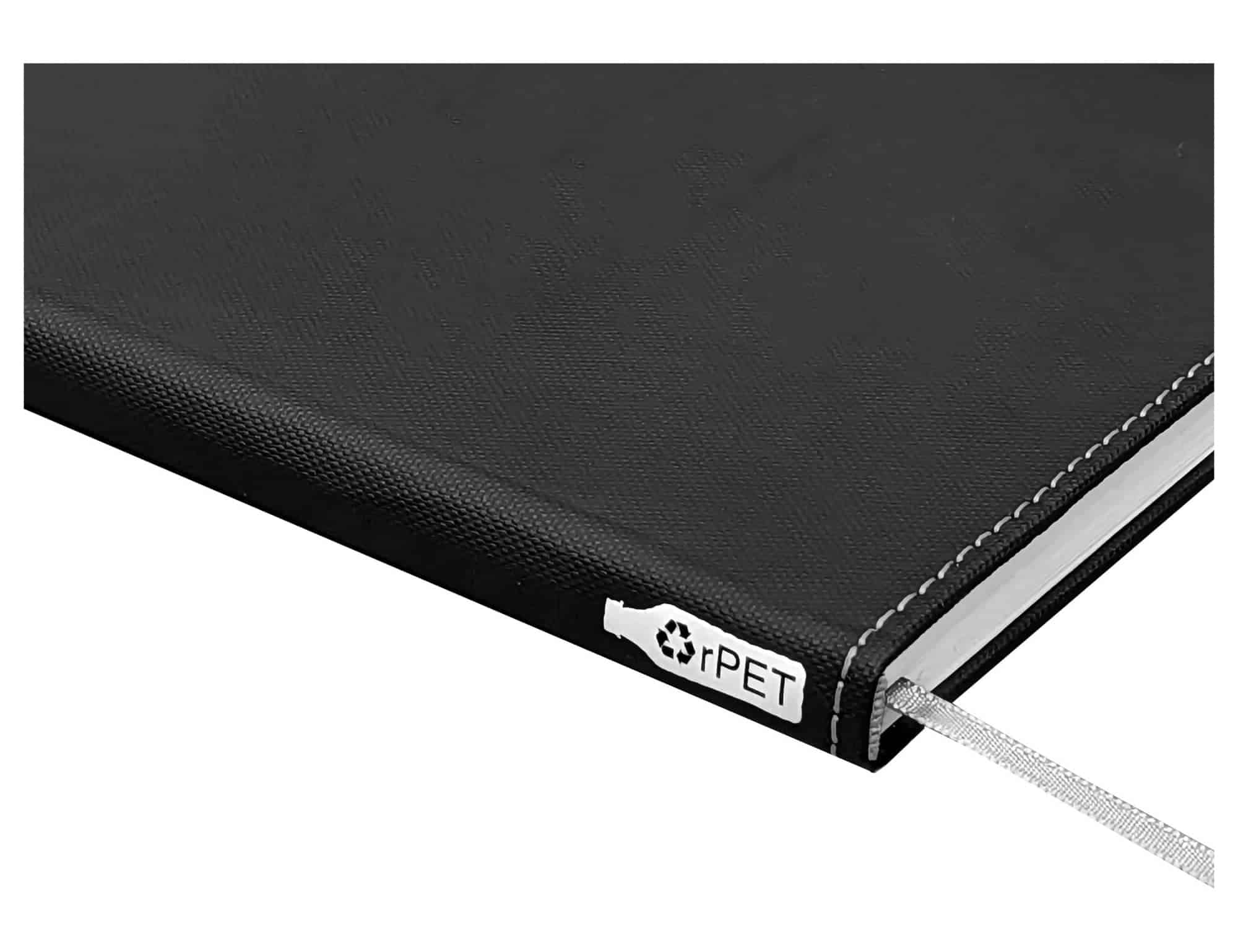 A black rPET A5 notebook with a textured cover and a ribbon bookmark, featuring a logo on the side.