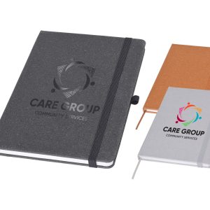 Three A5 notebooks in grey, orange, and white, featuring a logo on the covers and an elastic band closure.