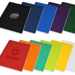 A range of A5 notebooks in various colours, including black, blue, purple, red, green, orange, yellow, and white, with branding on some.