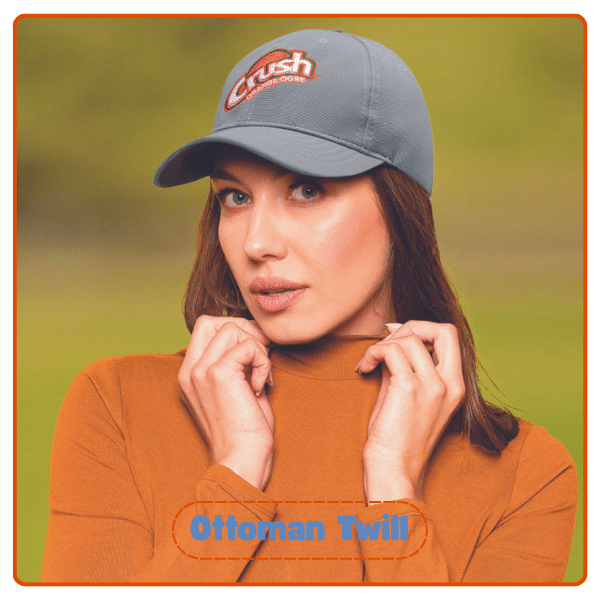 Model wearing a branded Ottoman Twill cap with Crush logo, demonstrating best branded merchandise for outdoor and promotional wear.