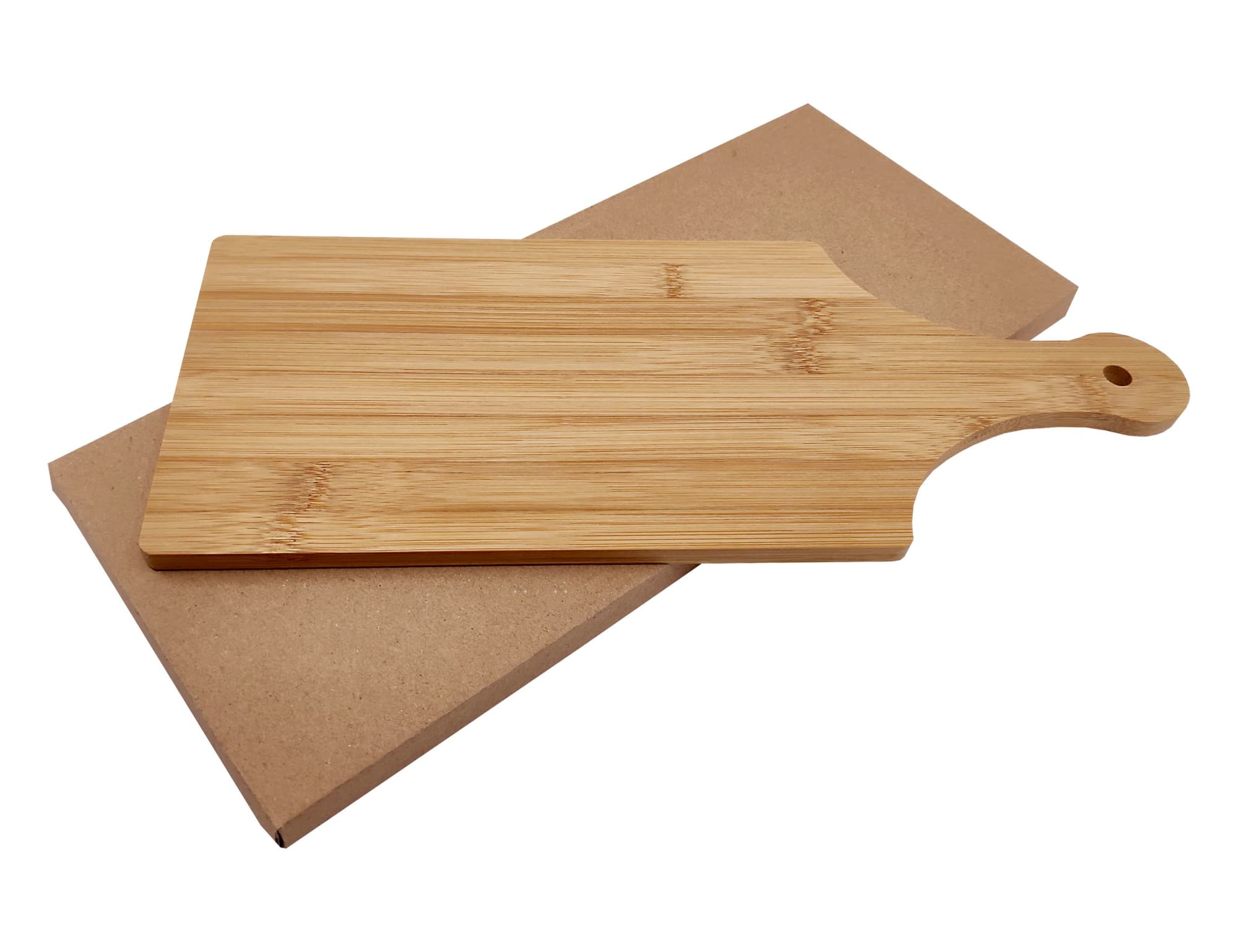 A bamboo cheese board with a handle, placed on a brown cardboard backing. It features a natural wood finish.