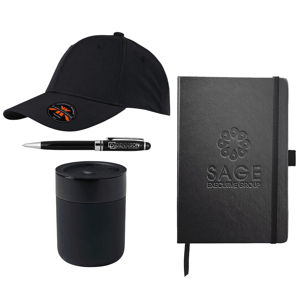 A black cap, black pen, black candle, and black notebook, all featuring branding elements.
