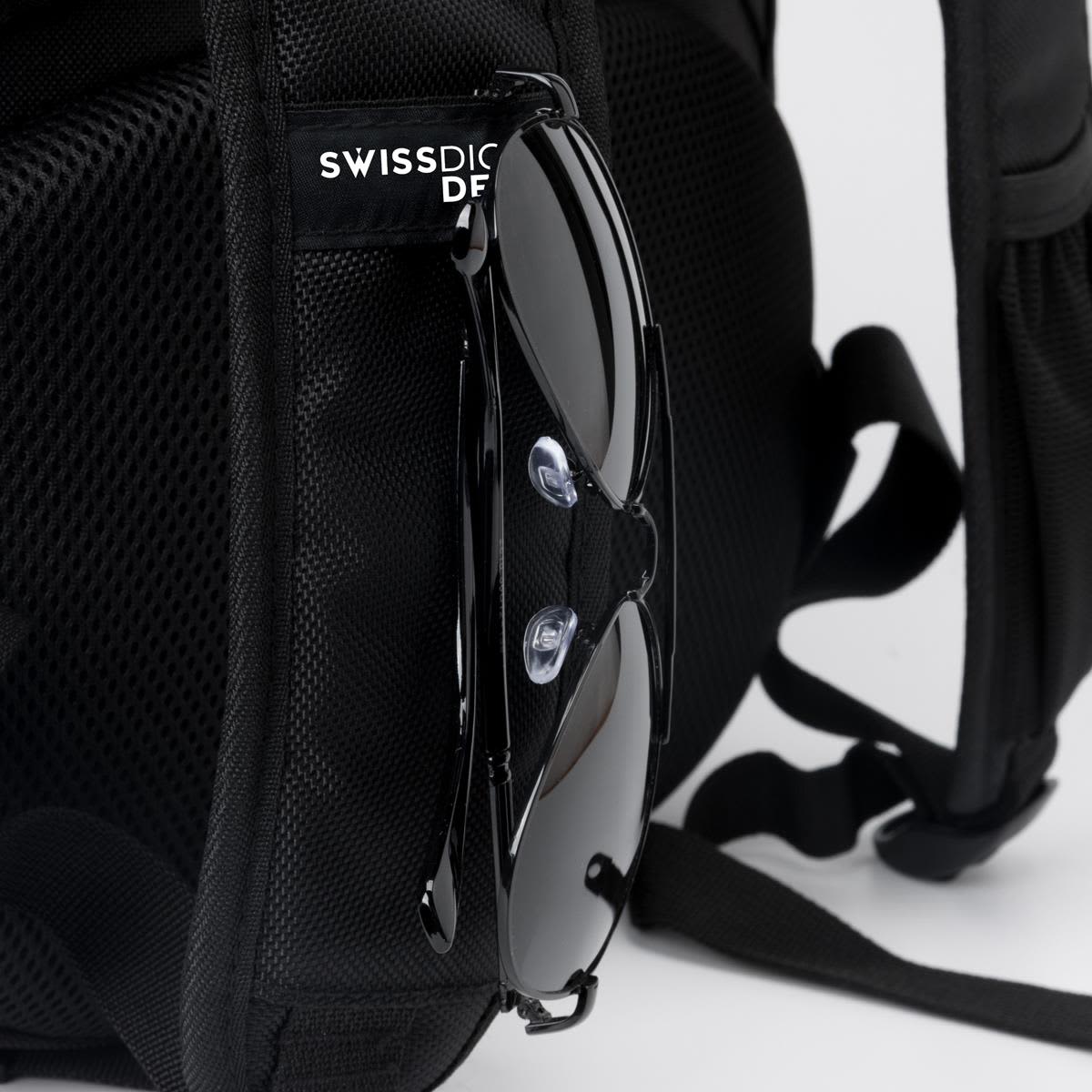 A black Swissdigital Neptune backpack with sunglasses resting on the side, featuring a logo on the front.