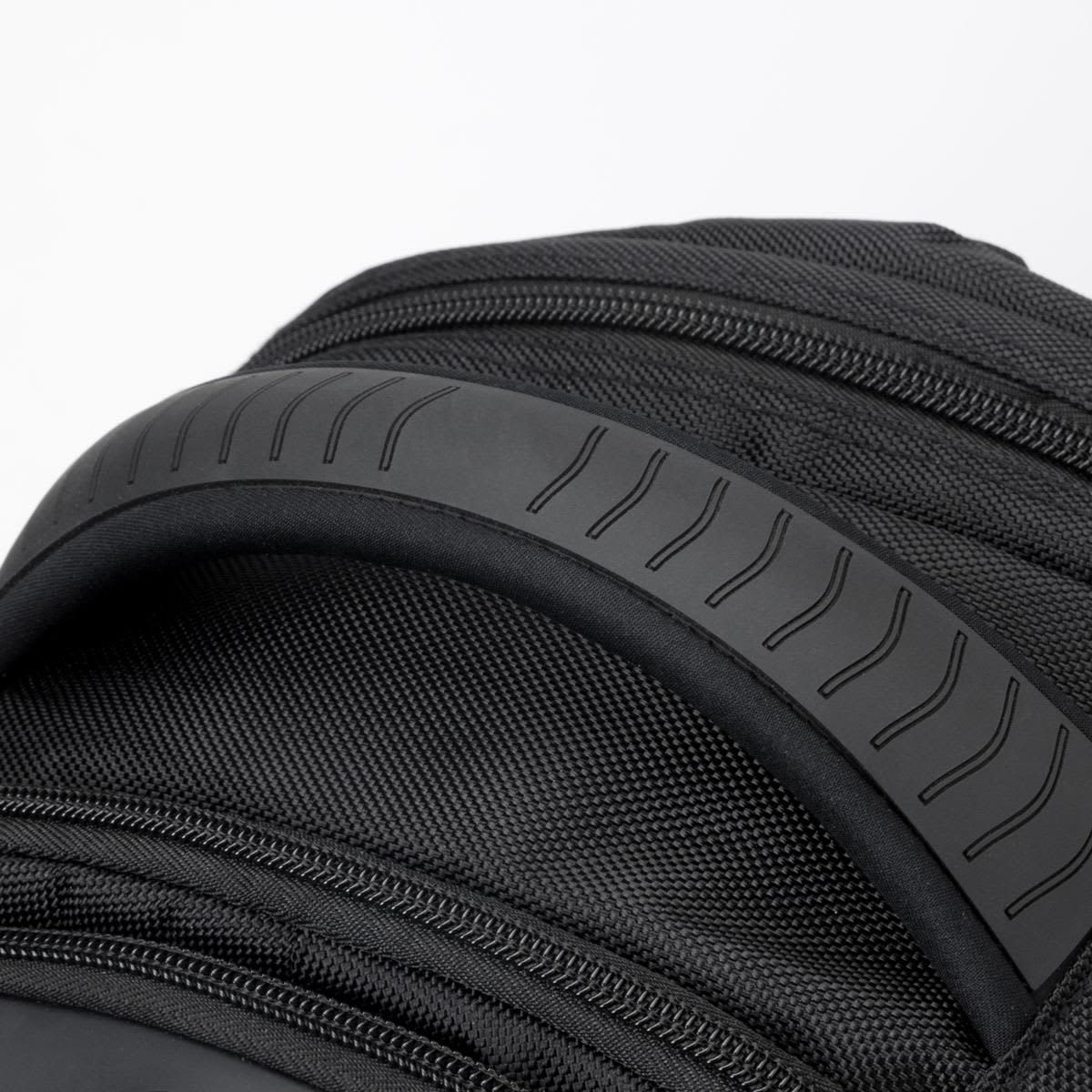 A black backpack featuring textured straps and multiple zippered compartments, with a prominent logo.