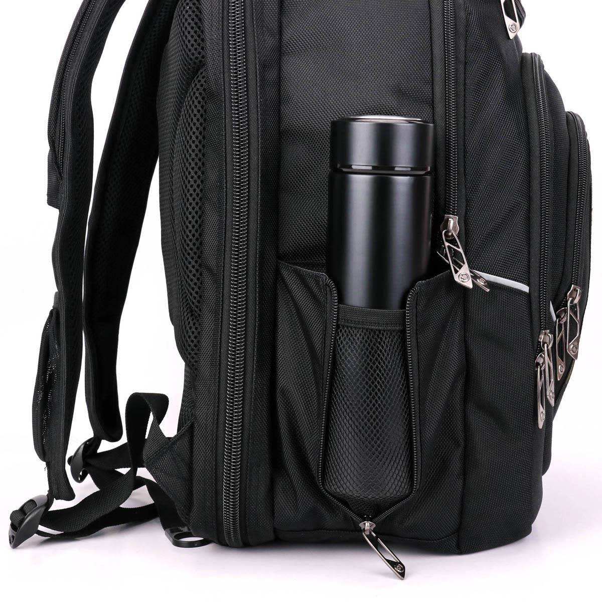 A black backpack with a drink bottle secured in a side pocket, featuring zippers and adjustable straps.