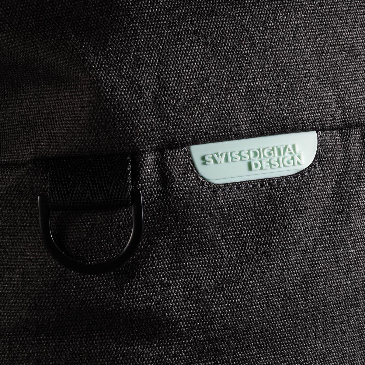 A black duffle bag featuring a light green logo tag and a metal loop attachment.