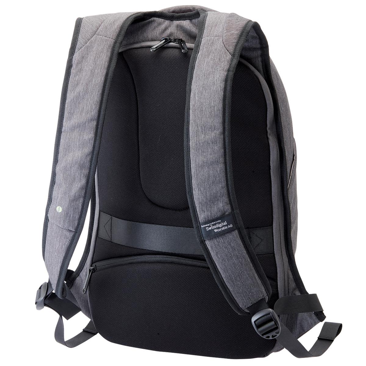 A grey backpack with padded straps and a textured back. It features a logo and anti-theft design.