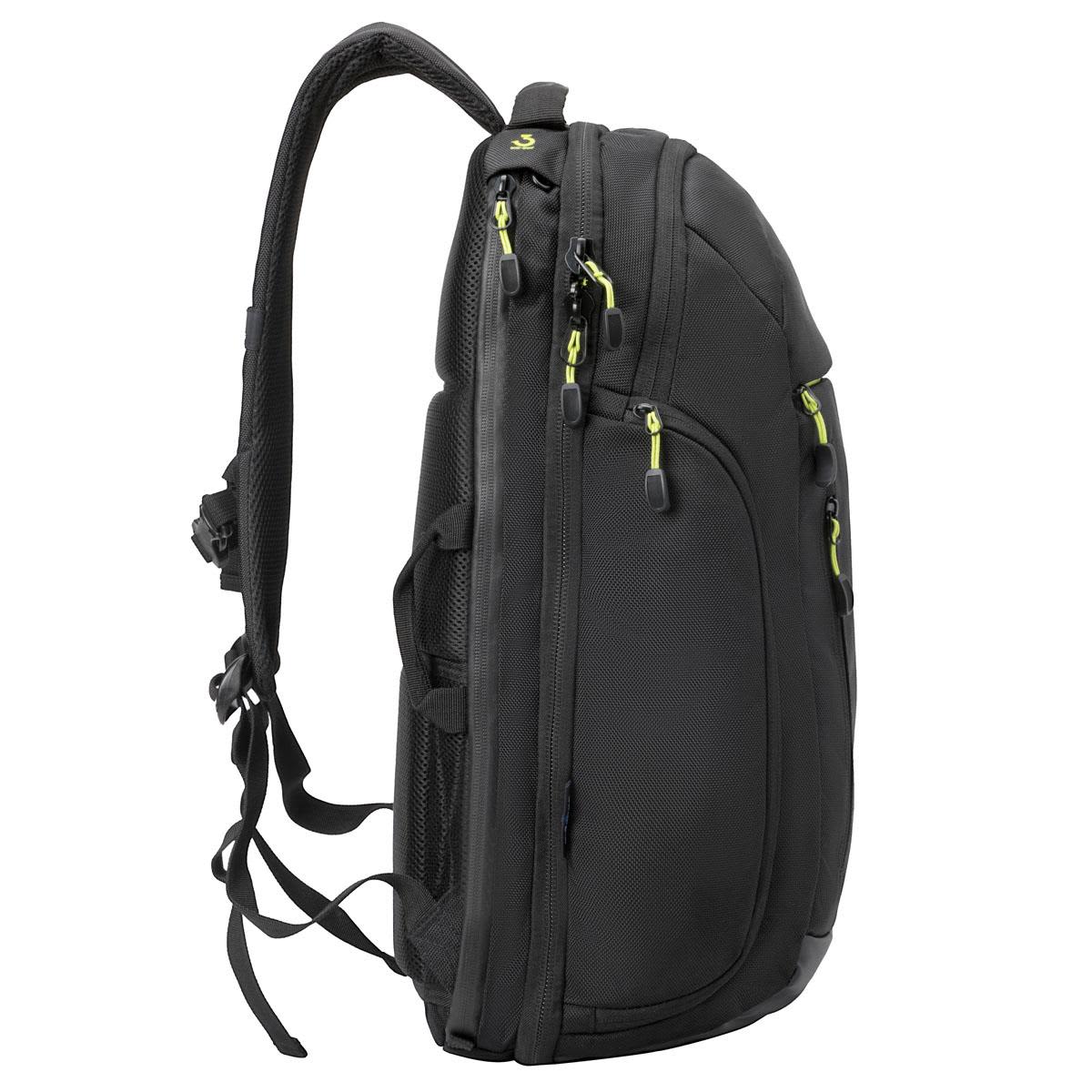 A black backpack with green accents, featuring multiple zippers and adjustable straps. It has a side profile view.