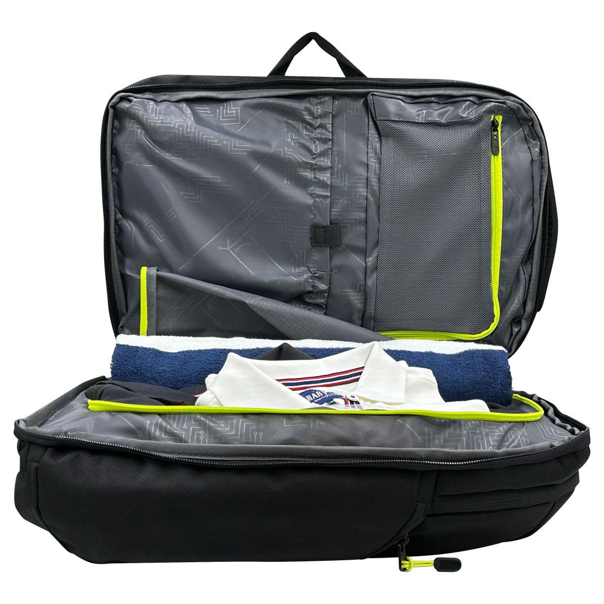 A black Swissdigital Java Backpack with yellow accents, featuring an open compartment revealing a towel and a folded shirt.