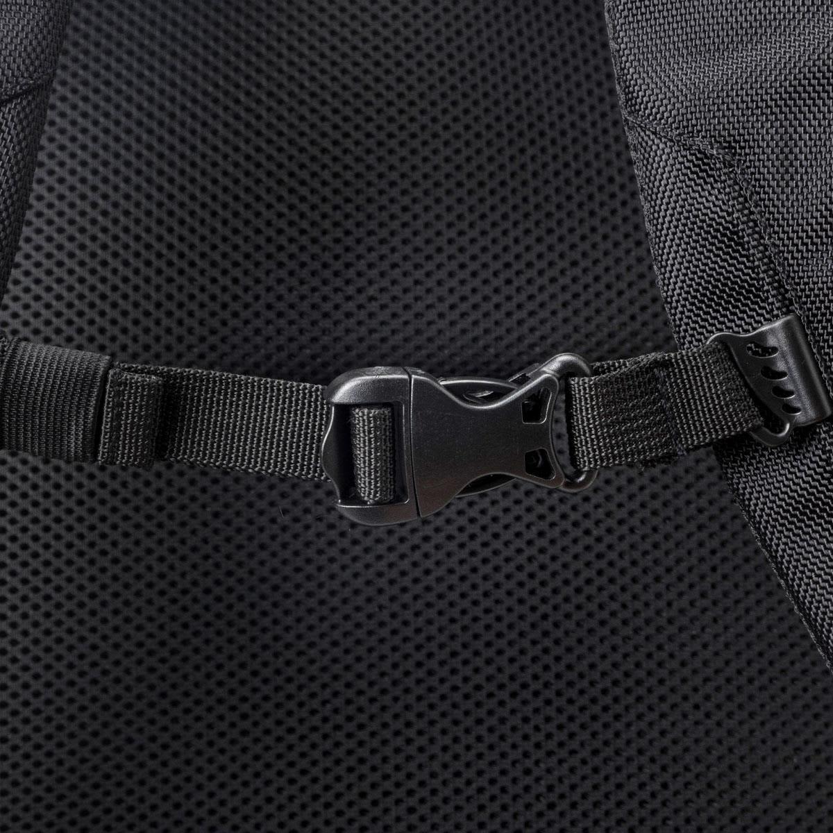 A close-up of a black adjustable buckle on a mesh-backed backpack. The texture is visible.