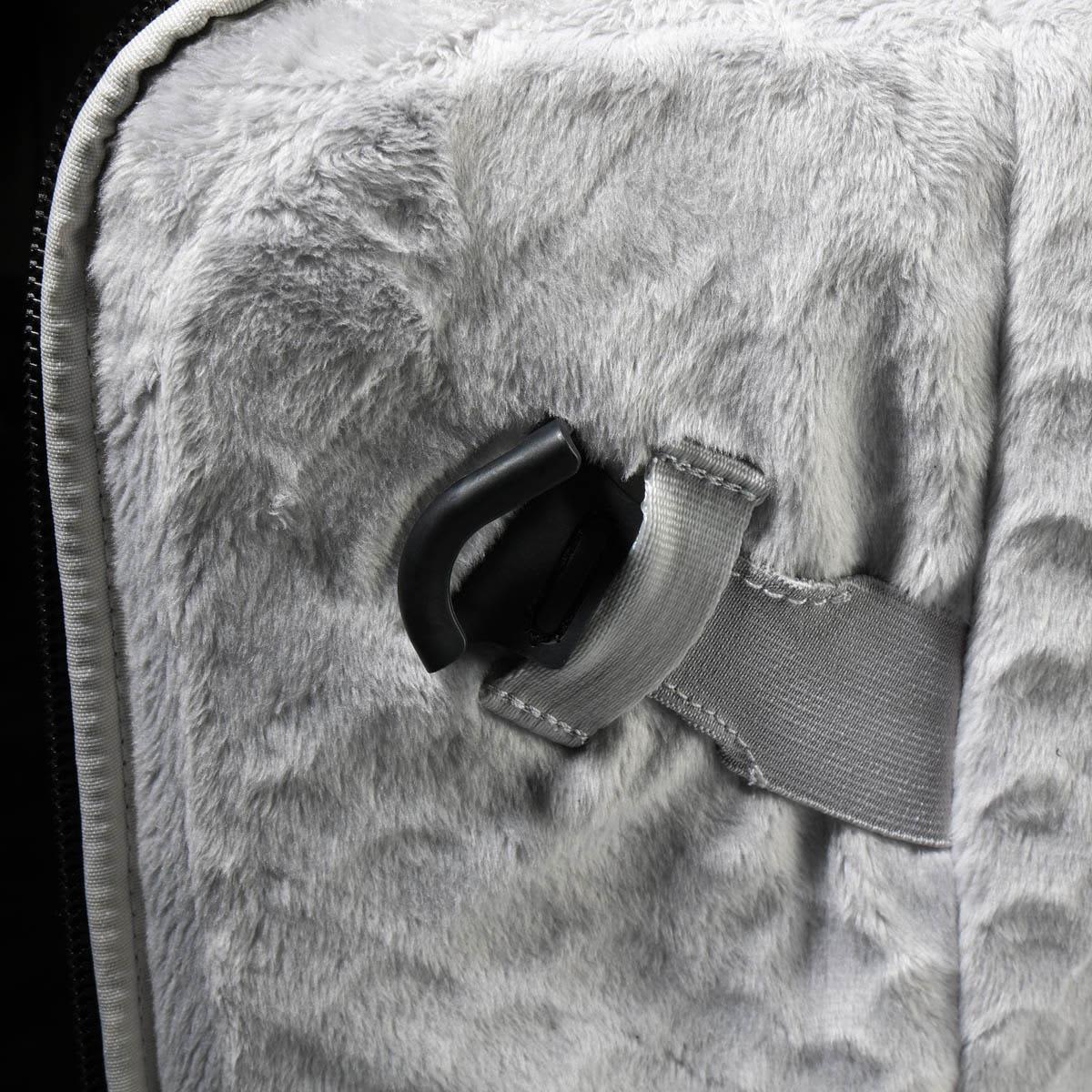 A grey laptop sleeve features a soft, plush interior and an adjustable strap with a clip attachment.