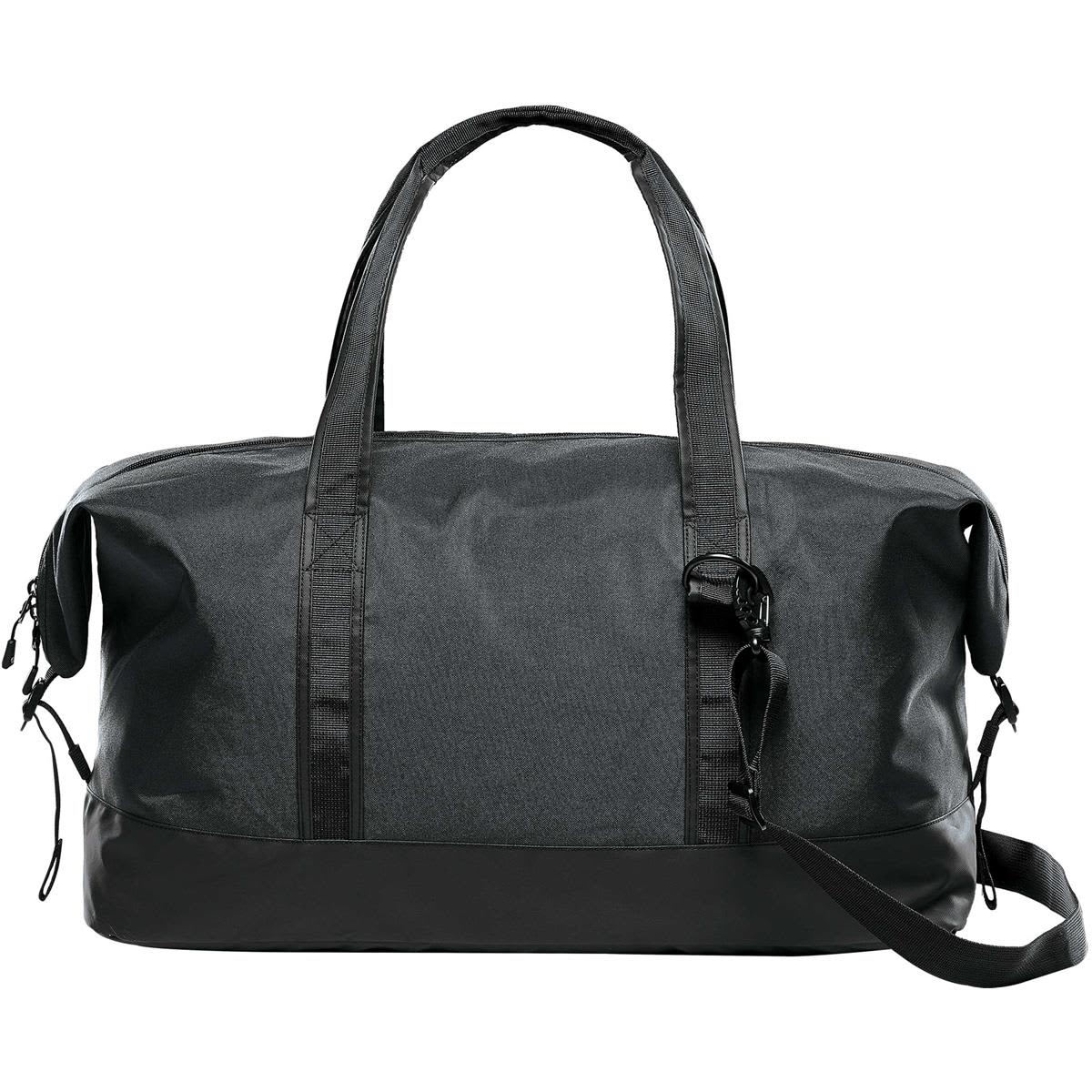 A dark green duffle bag with black accents, featuring two handles and an adjustable shoulder strap. It has a logo.