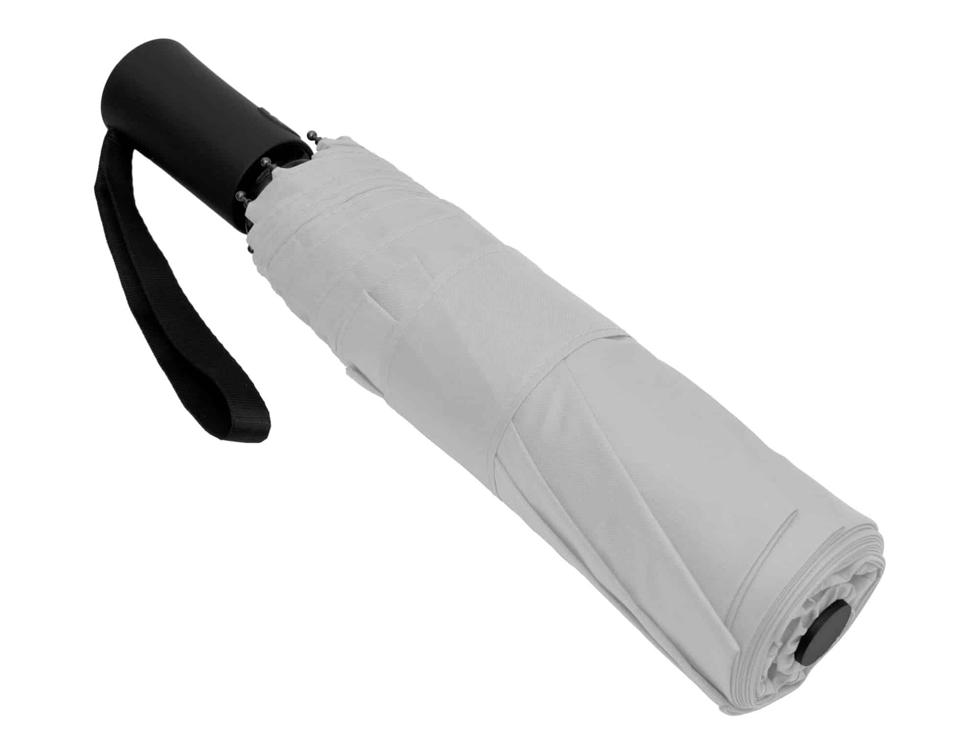 A fold-up umbrella in white with a black handle and a black strap for easy carrying.