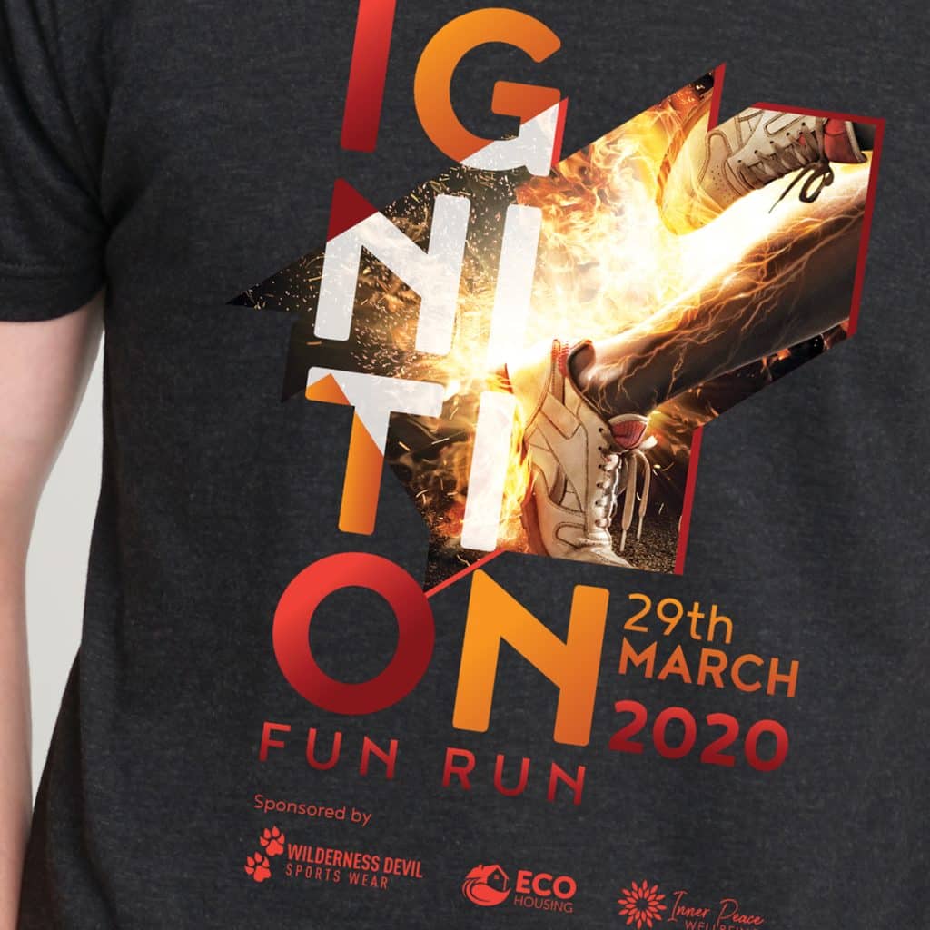 Full-colour SupaColour print of a fiery "Ignition Fun Run" design on black fabric, showing best branded merchandise for events and sponsorships.