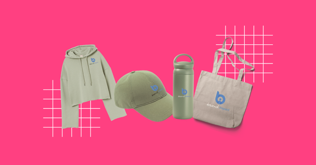 Green branded merchandise set including custom hoodie, cap, drink bottle and tote bag with logo on a vibrant pink background, showcasing promotional products and branded apparel.