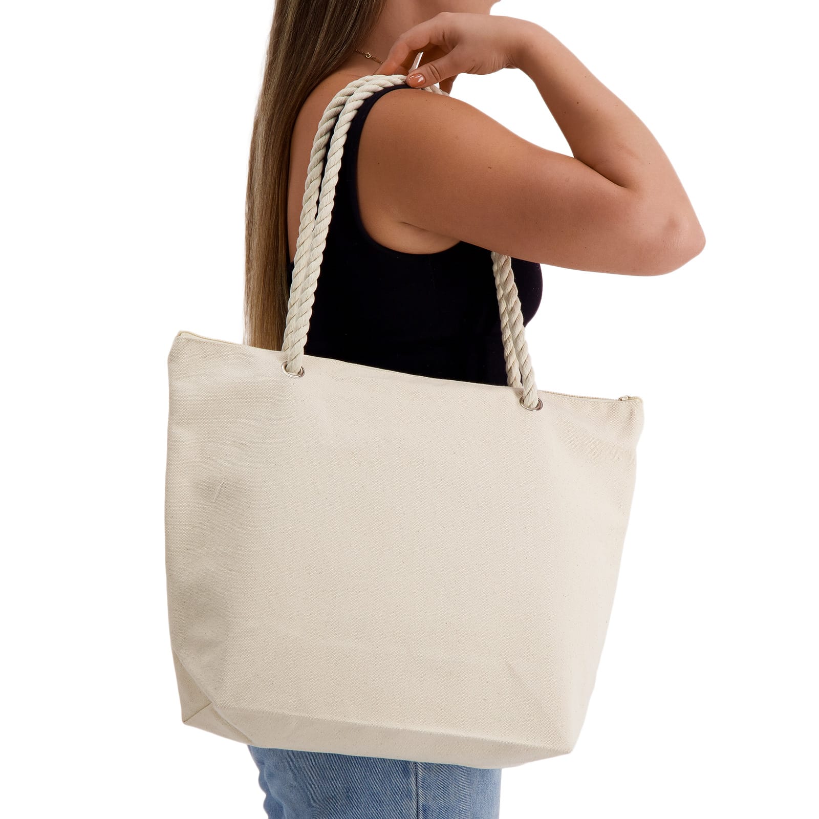 Woman carrying a natural canvas tote bag with rope handles over shoulder, representing eco-friendly promotional tote bags and custom branded bags for everyday use.