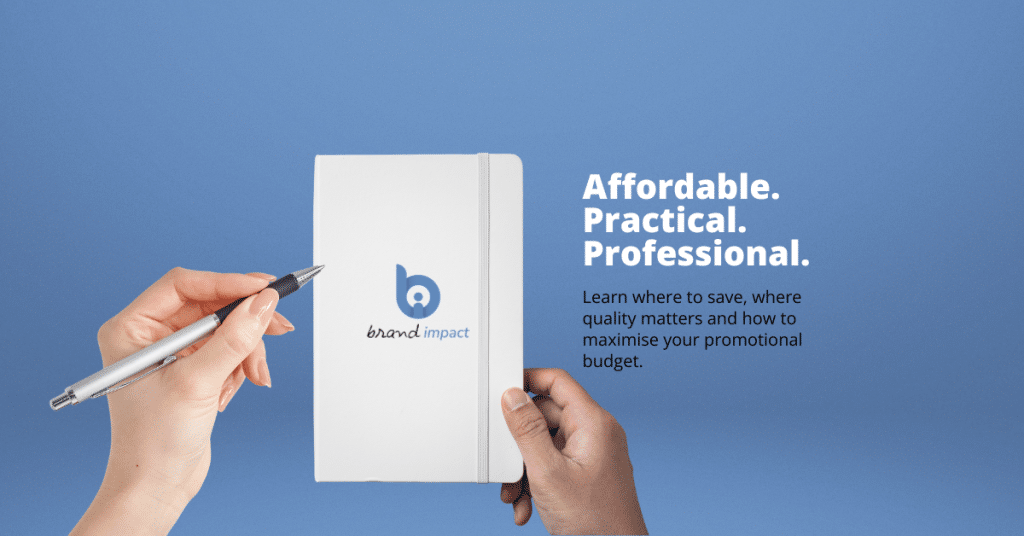 Hands holding a branded white notebook and silver pen against a blue gradient background. The banner features the headline “Affordable. Practical. Professional.” and promotes smart promotional product budgeting by helping businesses understand where to save, where quality matters and how to maximise long-term marketing value.